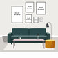 Modern living room setup with size guide for frame prints above a dark green sofa, featuring a coffee table and floor lamp.