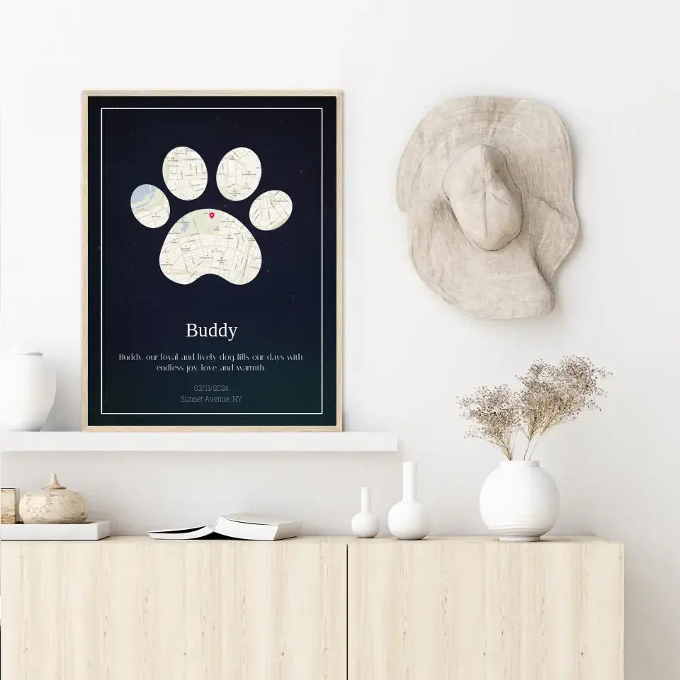 Custom paw print map poster on wall with pet's name and street map design, minimalist decor setting