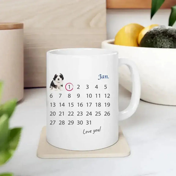 Custom pet photo mug with a calendar design, featuring important date marked. Perfect for celebrating pet anniversaries.