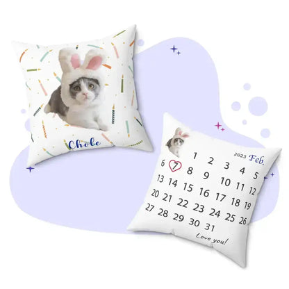 Personalized pet photo pillows featuring a cute cat with bunny ears and a custom February 2023 calendar design.