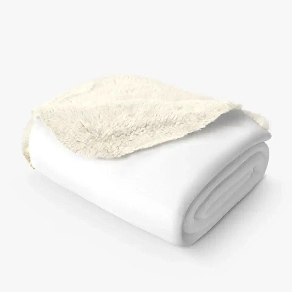 Soft white sherpa fleece throw blanket, perfect for Halloween, offers warmth and comfort for humans and pets.