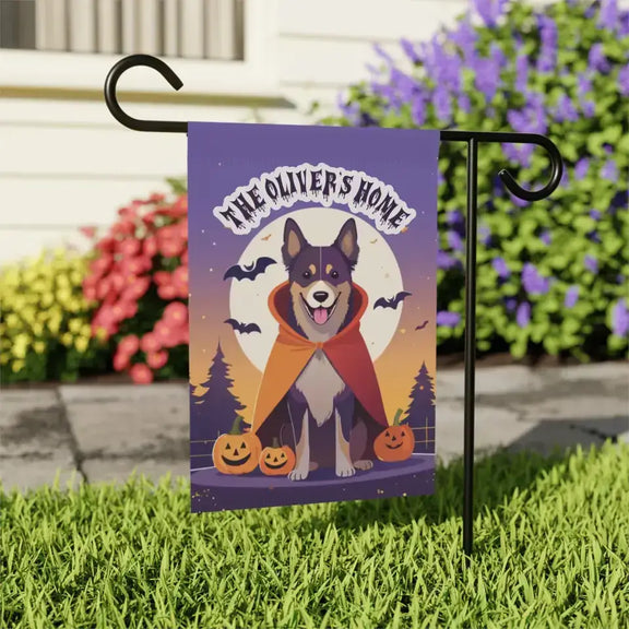 Personalized Halloween garden banner with dog in cape, pumpkins, bats, and "The Oliver's Home" text, ideal for festive decor.