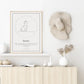 Minimalist dog-themed art print on shelf with decor items, celebrating cherished moments with beloved pets.