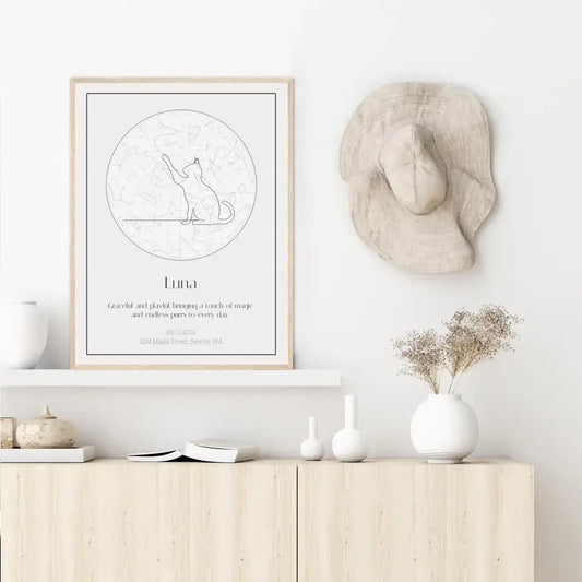 Personalized cat star map art on a shelf with minimalist decor, celebrating special moments with your cat.