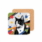 Pop Art-style cat coaster with black-and-white cat, vibrant geometric shapes, red stars, yellow circles, and blue squares.