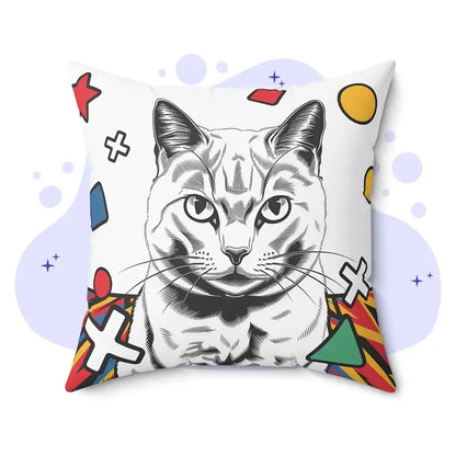 Black and white cat illustration pillow with pop art design featuring geometric shapes like red stars and yellow circles.