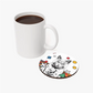 Black and white cat pop art coaster with coffee mug, featuring geometric shapes like stars and circles for a modern table decor.