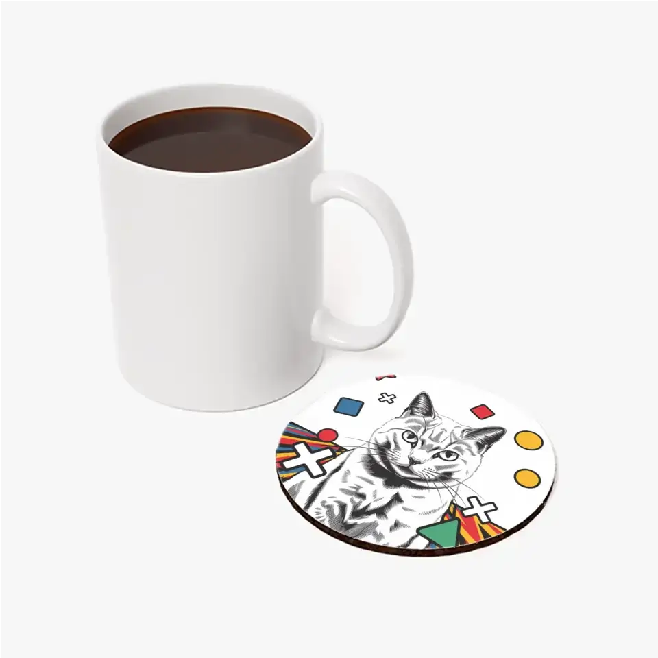 Black and white cat pop art coaster with coffee mug, featuring geometric shapes like stars and circles for a modern table decor.