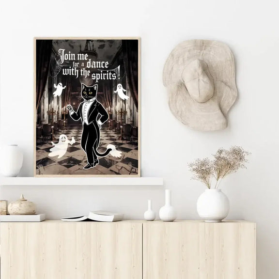 Halloween poster featuring a black cat in a tuxedo dancing with friendly ghosts in a framed art print.