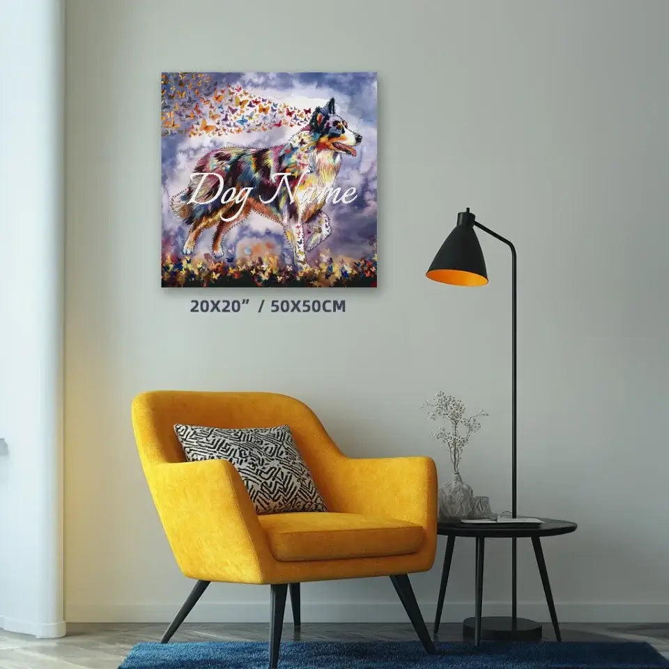 Australian Shepherd watercolor painting on canvas with butterflies, displayed above a yellow armchair in a modern living room.