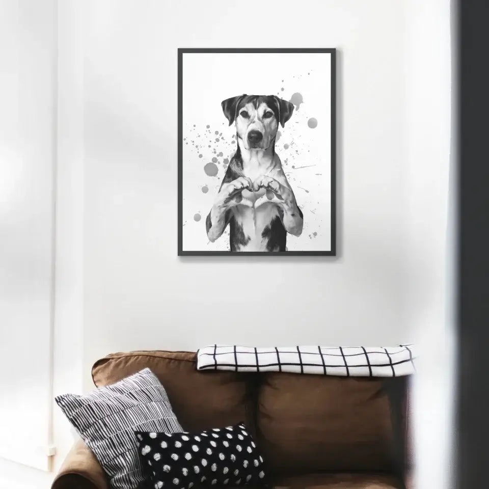 Framed print of a serious dog forming a heart with its paws, symbolizing love and loyalty, displayed above a brown couch with decorative pillows.