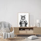 Monochrome framed cat print showing a cat crafting a heart with its paws on a stylish living room shelf.