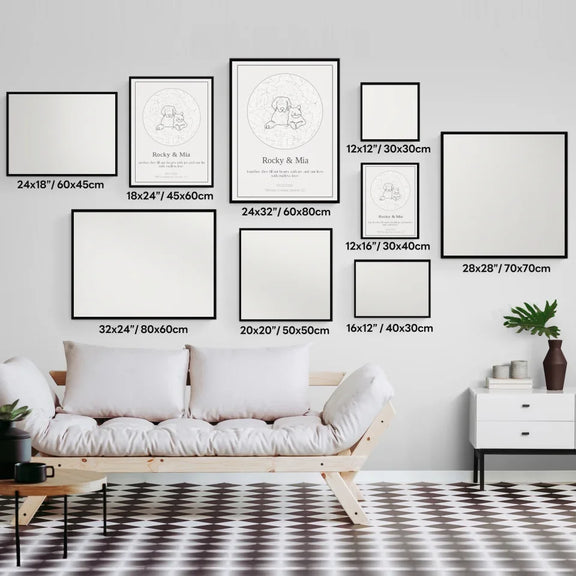 Personalized pet star prints in various frame sizes displayed on a wall above a white sofa with pillows and a side table.