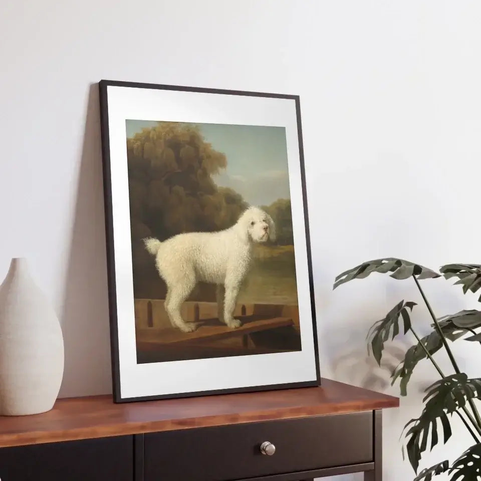 Victorian art print of a white poodle in a boat, showcasing elegance and charm, framed and displayed on a wooden cabinet.