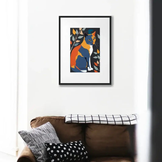 Framed colorful Matisse cats art print on wall above sofa, vibrant feline artwork in living room setting.