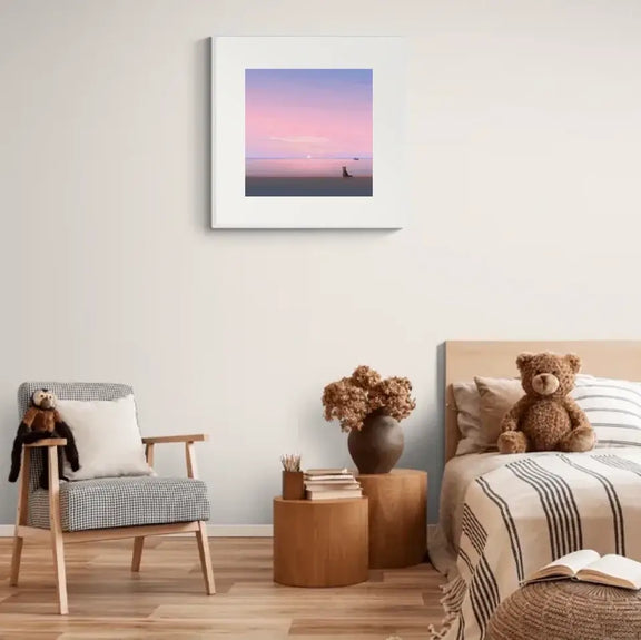 Art print "Silent Paws Before Sunset" featuring a cat at twilight, adorning a modern bedroom, evoking tranquility and warmth.