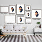 "Gallery wall featuring multiple sizes of Cityscape Cats: Miami Edition art prints, depicting Miami's vibrant essence in cat form."