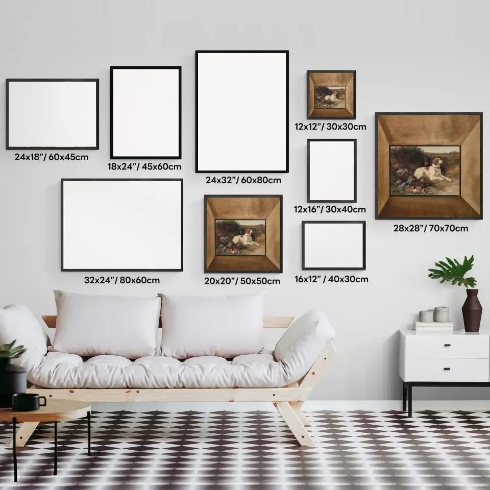 Gallery wall with various-sized art frames above a couch, featuring dog and pheasant prints, perfect for home decor inspiration.