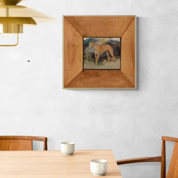 Deerhound oil painting art print in wooden frame hung on a modern wall, adding sophistication and warmth to the dining room decor.