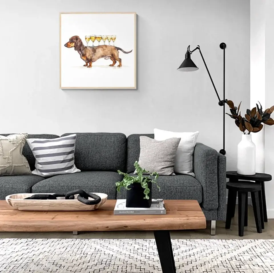 Cozy living room featuring a charming dachshund art print with drinks, adding humor and warmth to the decor.