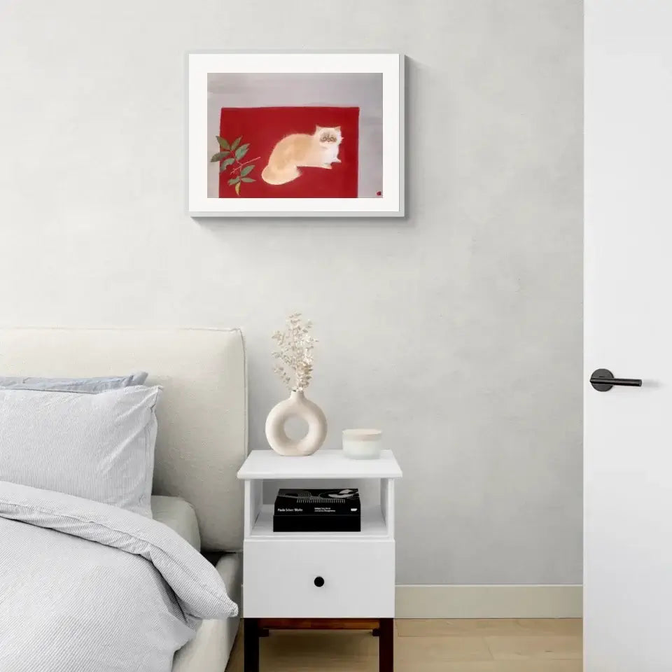 Japanese cat painting "Leisure Day" by Togyu Okumura displayed above a modern bedroom nightstand with minimal decor.