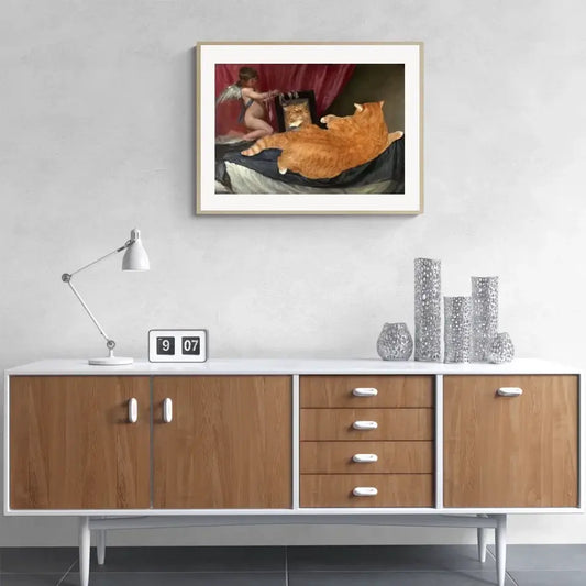 "Venus in Furs Fine Art Print on wall above modern console, blending classical art with playful feline twist for cat lovers."