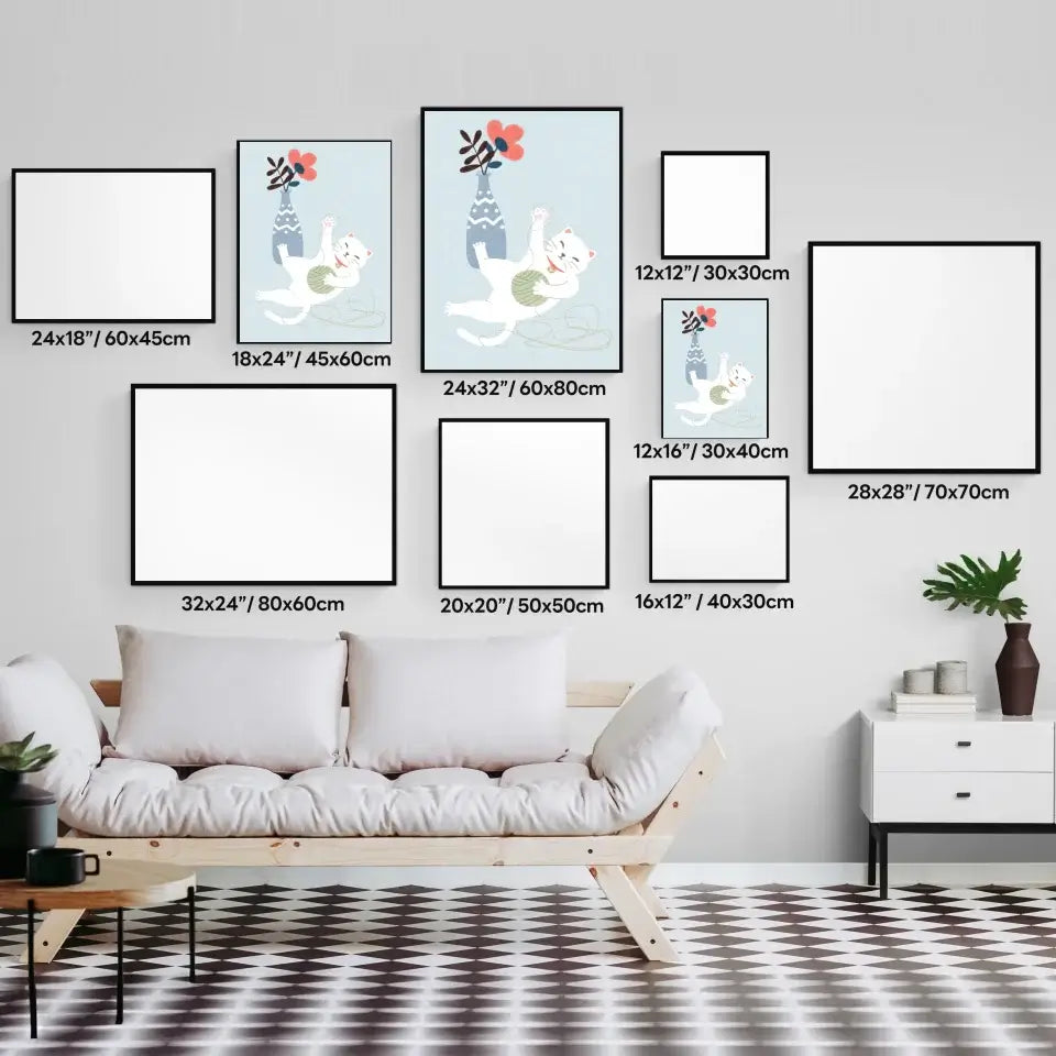 Gallery wall layout with various art print sizes including a playful cat with yarn print, displayed above a stylish couch.